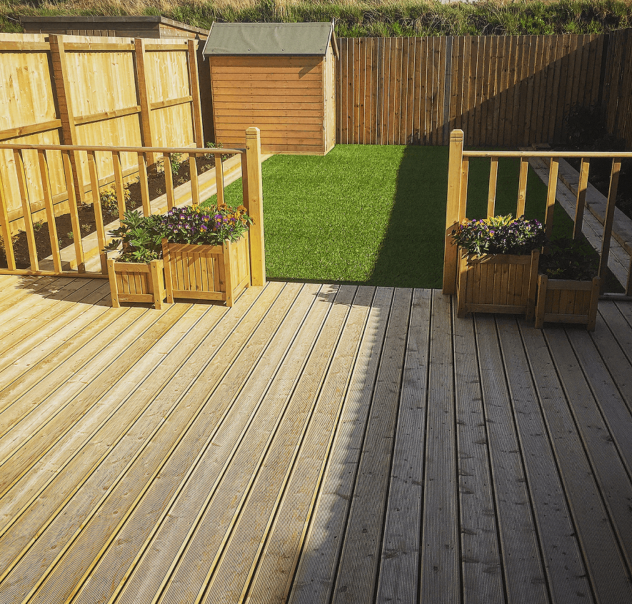 Sunlit patio and green lawn