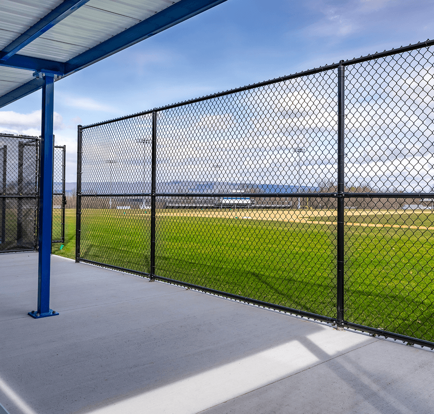 Empty sports field with blue sky